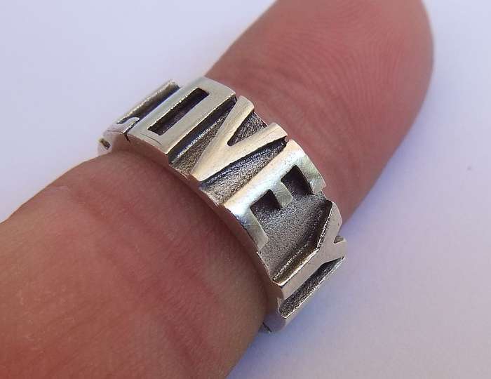 A UNIQUE THICK QUALITY SOLID STERLING SILVER RING WITH " I LOVE YOU " MOTIF !! MAYBE ONE OF A KIND !