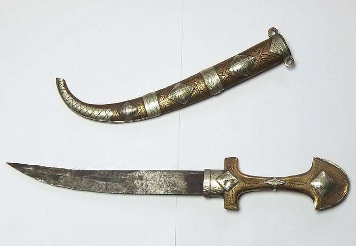 A large vintage Turkish dagger with detailed sheath in display condition