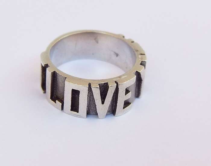 A UNIQUE THICK QUALITY SOLID STERLING SILVER RING WITH " I LOVE YOU " MOTIF !! MAYBE ONE OF A KIND !