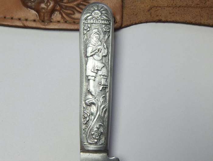 A rare vintage detailed Argentinian Gaucho knife with genuine leather pouch depicting a stag