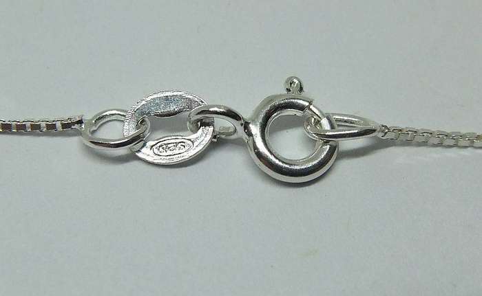 A vintage solid silver Aries Zodiac sign pendant with a sterling silver necklace