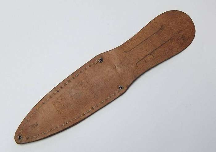 A rare vintage detailed Argentinian Gaucho knife with genuine leather pouch depicting a stag
