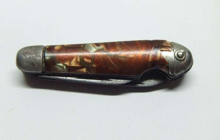 A VERY OLD TICKEY POCKET SIZED KNIFE TOOL USED FOR CLEANING SMOKING PIPES IN THIS CASE ...TOO CUTE !