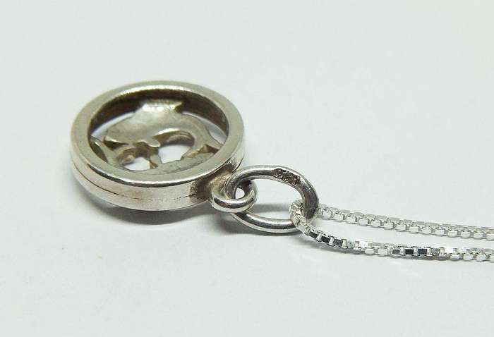 A vintage German 835 silver Pisces Zodiac sign pendant plus a sterling silver necklace
