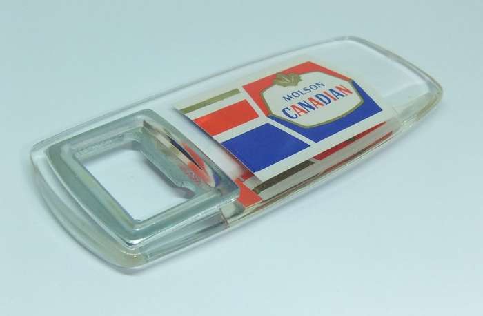A VINTAGE BOTTLE OPENER ADVERTISING MOLSON CANADA