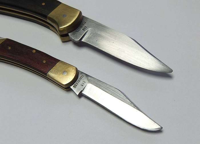 Two heavy quality brass and wood folding pocket knives by Gordon with 440 stainless steel blades