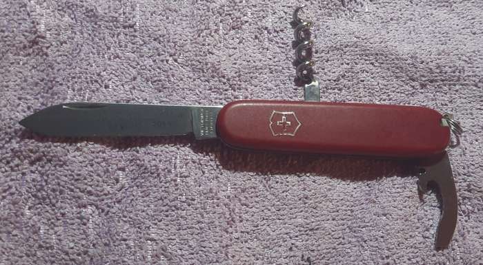 Victorinox - Recruit with Red Nylon Scales condition and tools as per pictures