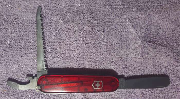 Victorinox Swiss Army Knife - My First Victorinox  Red Translucent  Scales condition as per pictures