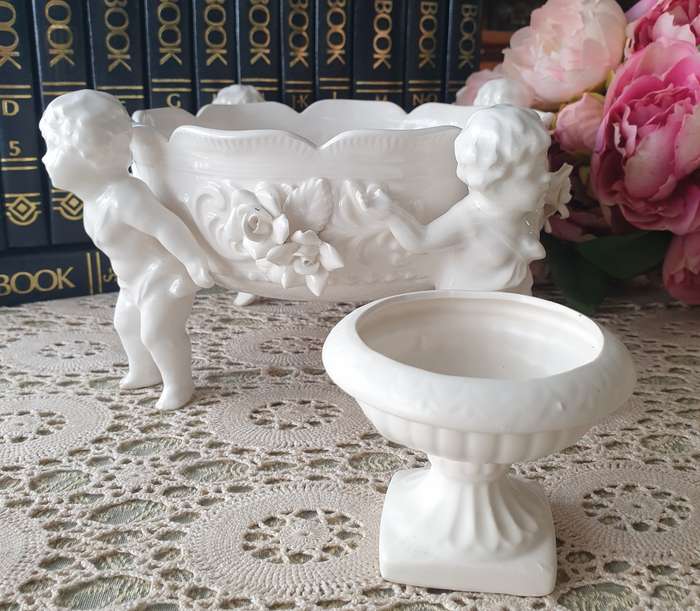 White Italian Continental blanc de Chine center bowl depicting four putti Cherubs + Small Vase