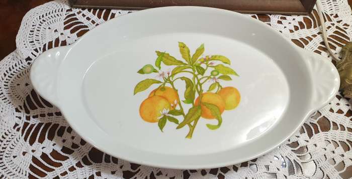 serving platter marked "Tradition CNP France," likely dating back to the 1970s