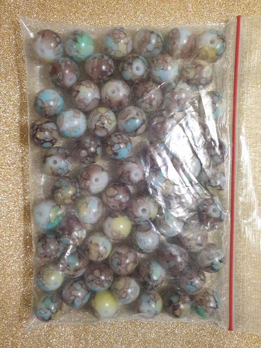 A packet of glass beads