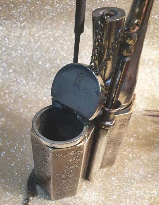 A Chinese white metal opium pipe