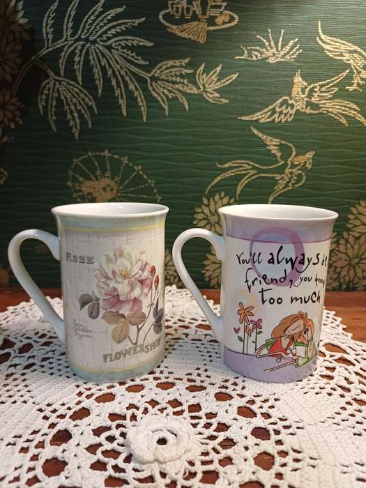 TWO COFFEE CUPS
