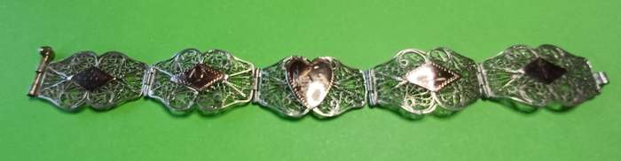 Vintage silver filigree and copper link bracelet  | 33 |