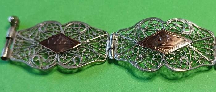 Vintage silver filigree and copper link bracelet  | 33 |
