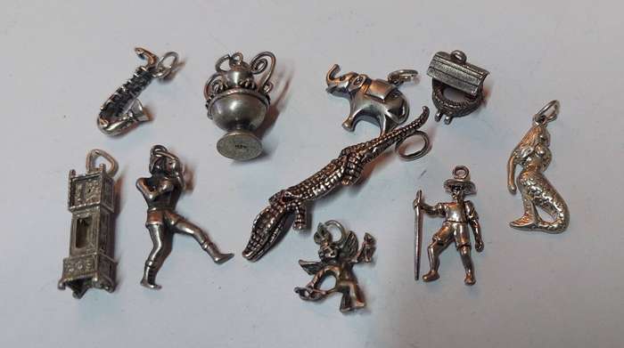 Collection of 10 vintage sterling silver charms 1 articulated croc 25g