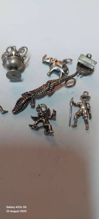 Collection of 10 vintage sterling silver charms 1 articulated croc 25g