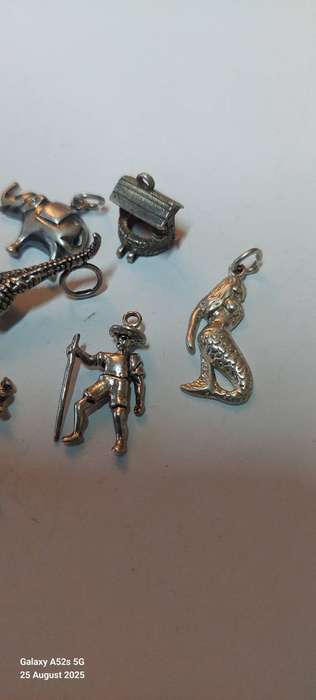 Collection of 10 vintage sterling silver charms 1 articulated croc 25g