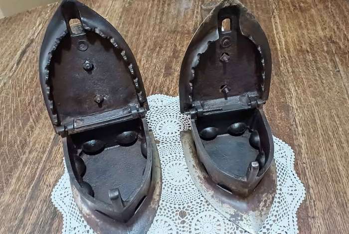 Pair of large antique Special number 10. Tested Coal Irons, latched with wooden handles