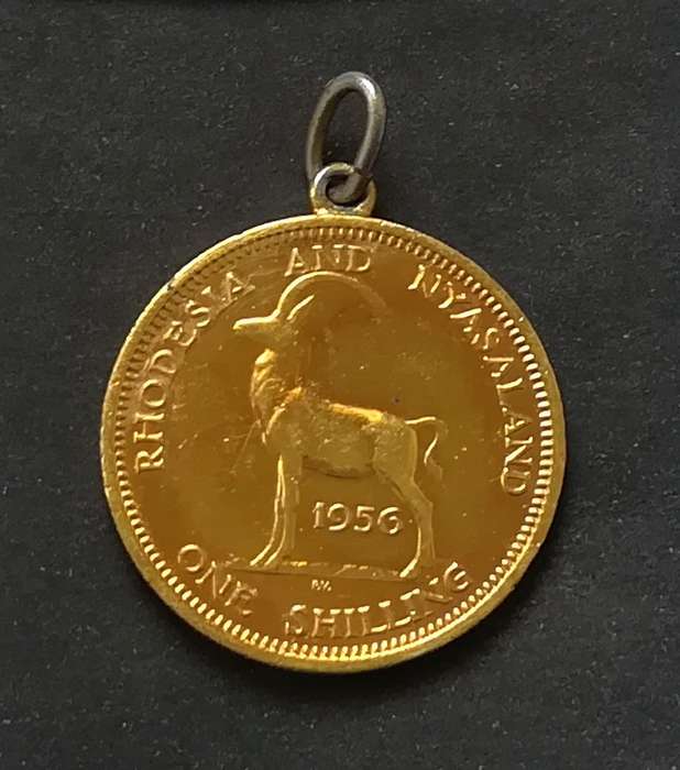 RHODESIA AND NYASALAND 1956 SHILLING *GOLD PLATED* PENDANT