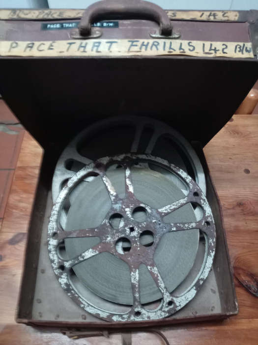 16mm MOVIE REELS IN CASE. " THE PACE THAT PHRILLS"
