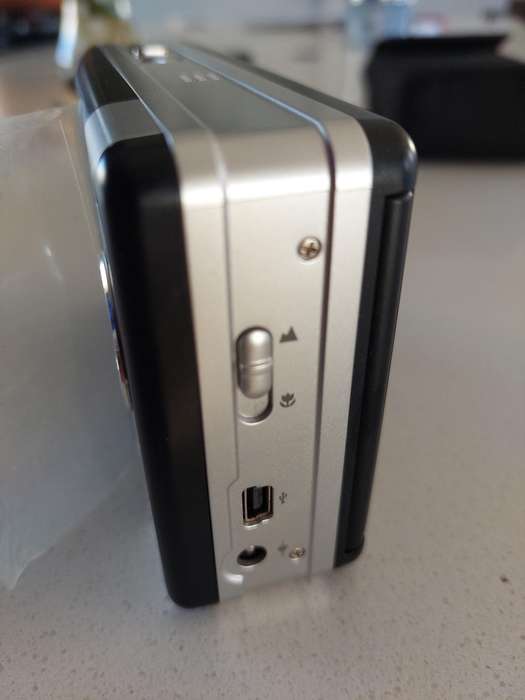 Poloroid Pogo instant digital camera (LIKE NEW) still has plastics on the camera.