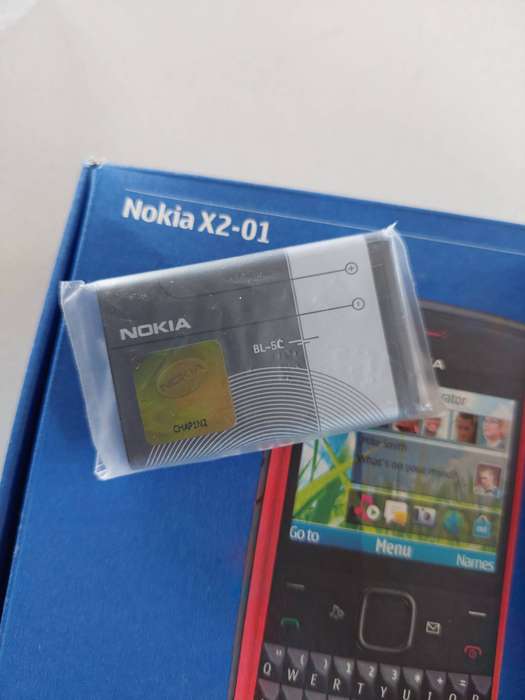BRAND NEW Nokia X2-01 - unused, plastics still on phone. The fone is FLAWLESS.