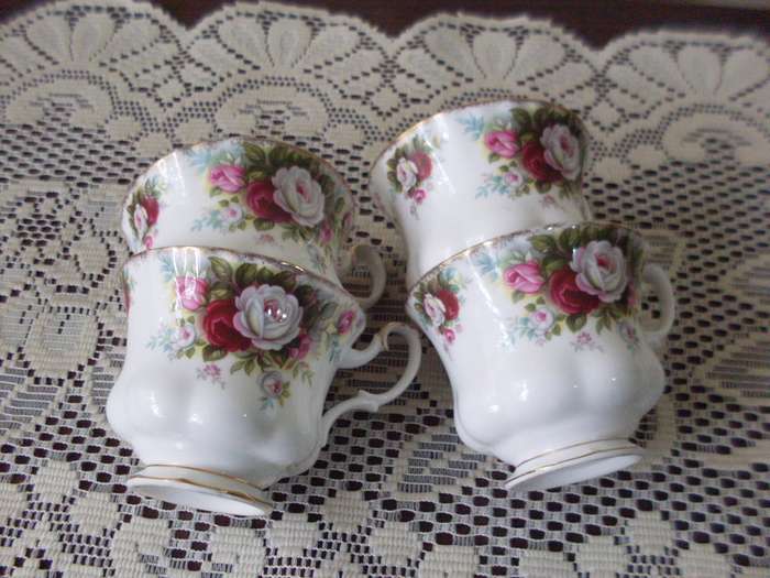 4 ROYAL ALBERT TEACUPS...CELEBRATION PATTERN