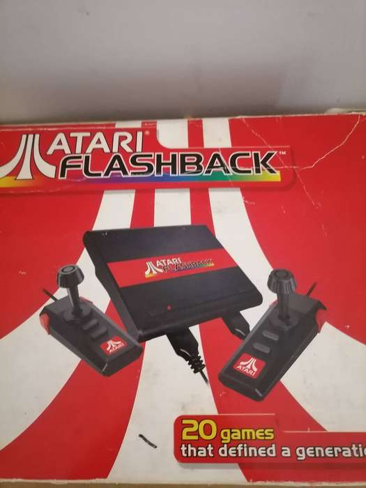 Atari Flashback console, a retro gaming system, 20 built-in games, two wired controllers & Power sup