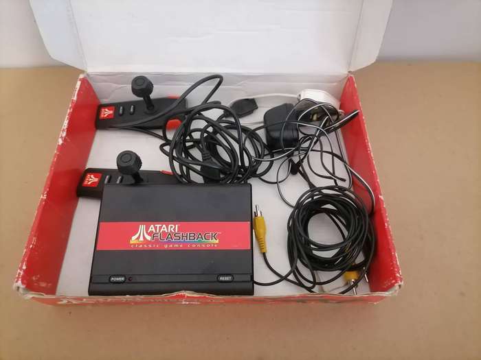 Atari Flashback console, a retro gaming system, 20 built-in games, two wired controllers & Power sup