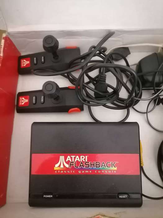 Atari Flashback console, a retro gaming system, 20 built-in games, two wired controllers & Power sup
