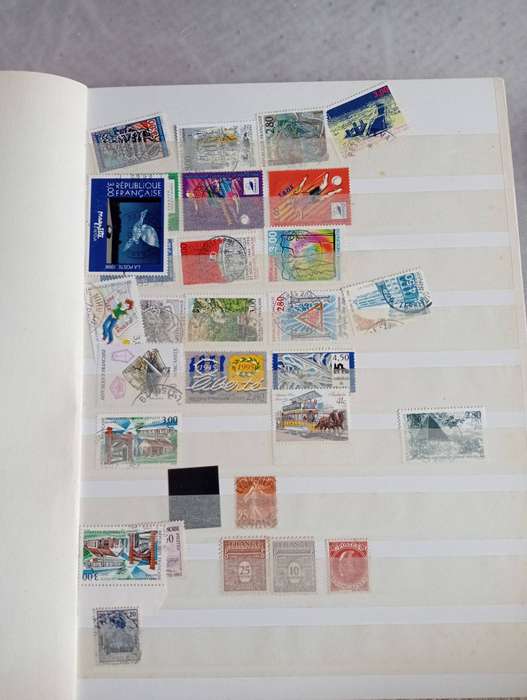 STOCK BOOK with a mix-some useful mint/used.SCARCE GERMAN LABEL'S included !!!