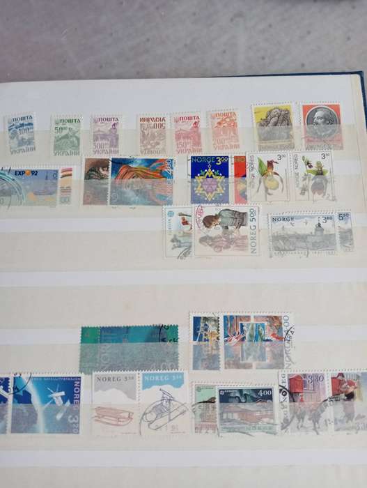 STOCK BOOK with a mix-some useful mint/used.SCARCE GERMAN LABEL'S included !!!