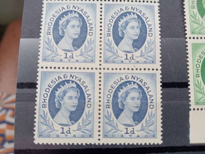 RHODESIA & NYASALAND QEII blocks umm one showing NICE SMUDGE FLAW