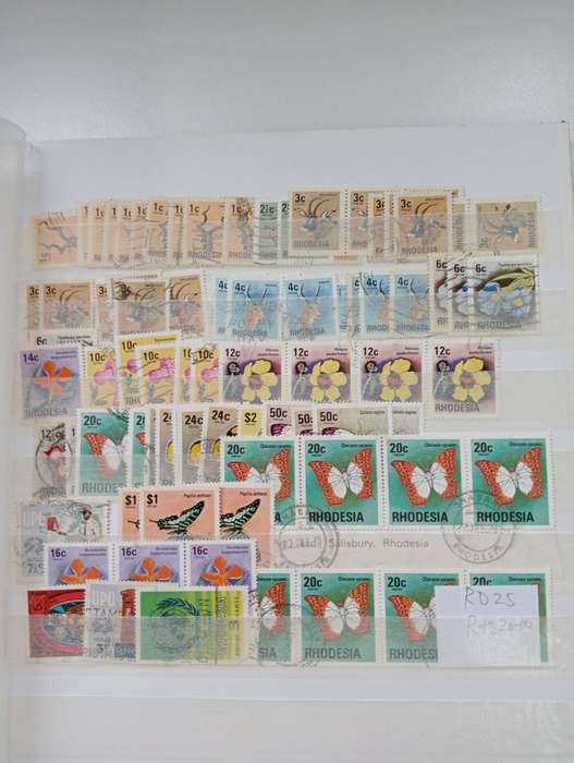 RHODESIAS-MUST HAVE FAT STOCK BOOK WITH MANY GOODIES !! MUST SEE BELOW