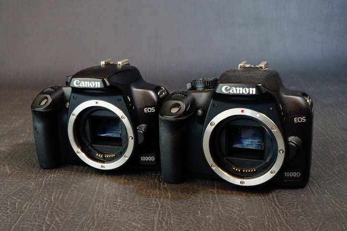 2 x Canon EOS 1000D Digital SLR Camera Bodies  **NON FUNCTIONAL SPARES OR REPAIR**