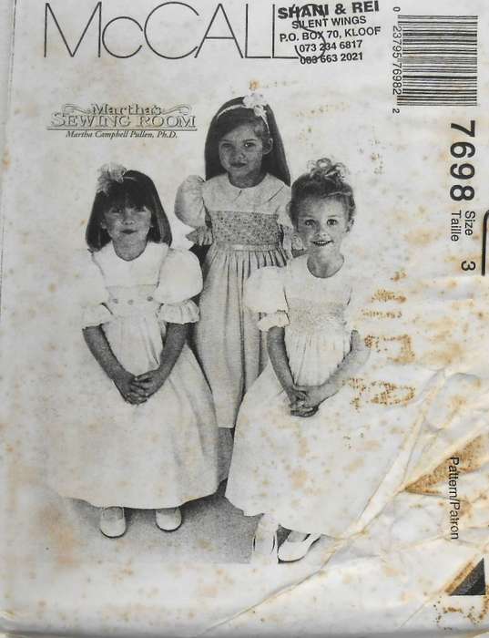 McCALLS 7698 GIRLS SMOCKED DRESS SIZE 3 YEARS COMPLETE-UNCUT-F/FOLDED-NO COVER-ORIGINAL PATTERN