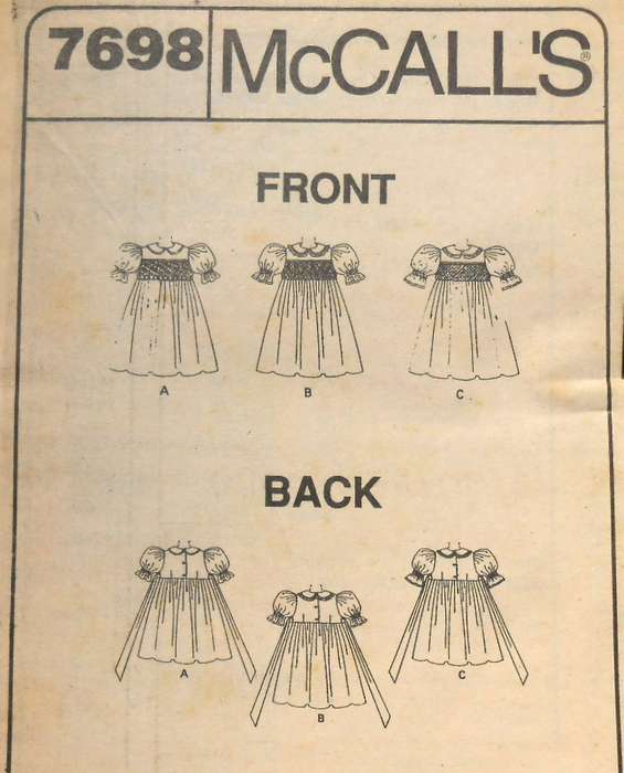 McCALLS 7698 GIRLS SMOCKED DRESS SIZE 5 YEARS COMPLETE-UNCUT-F/FOLDED-NO COVER-ORIGINAL PATTERN