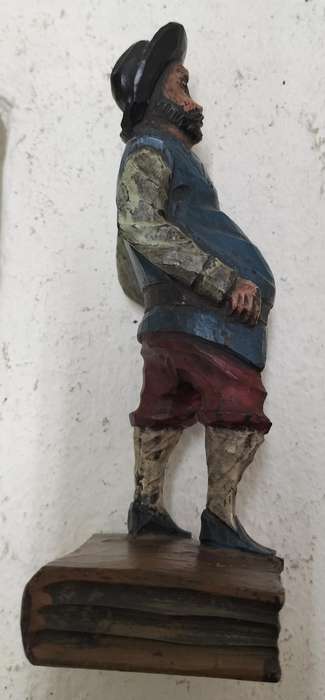Vintage European wood carving - Sancho Panza standing on book