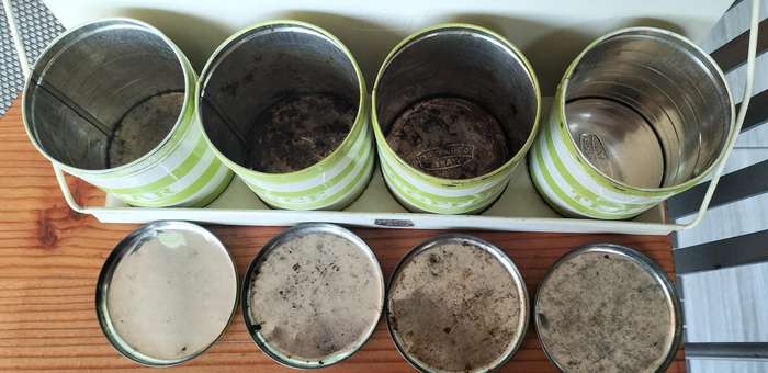 Set of Goodhope Ware kitchen canisters with metal shelve