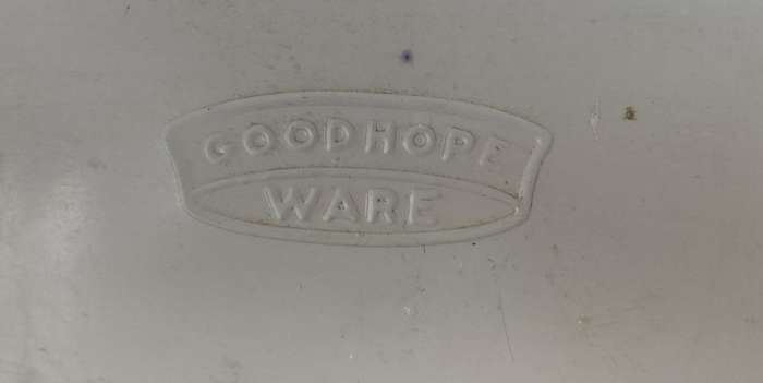 Set of Goodhope Ware kitchen canisters with metal shelve