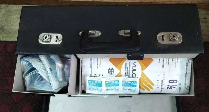 Vintage General Practitioners bandage / syringe case filled with essential medical items