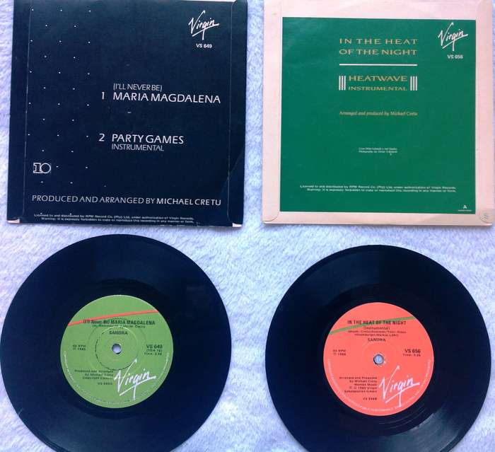 TWO seven single vinyl records - 45 RPM - Sandra - Maria Magdalena and In the Heat of the Night