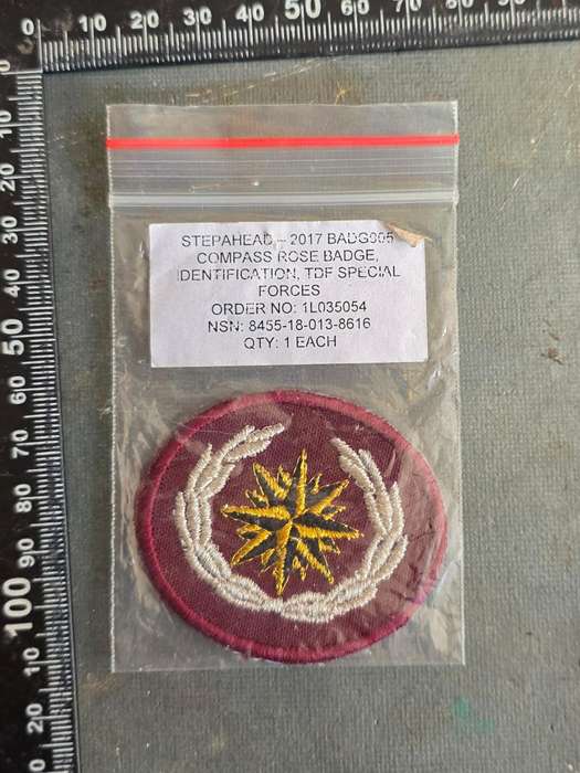 SPECIAL FORCES BERET BADGE IN PACKET OF ISSUE