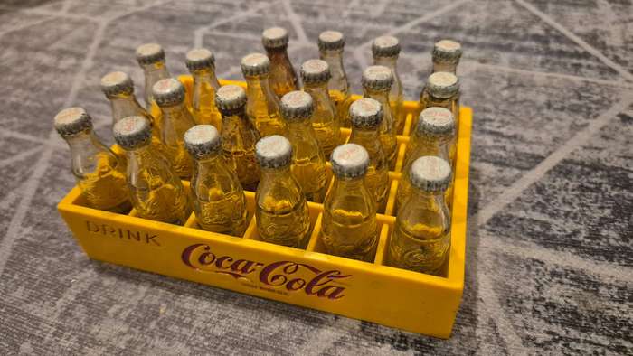 Hugely collectable Coca Cola miniature crate set - 22 bottles