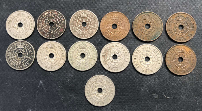 COLLECTION OF 13 SOUTHERN RHODESIAN PENNIES DATING FROM 1938 TO 1952