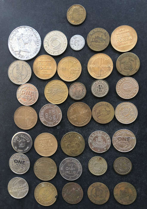 1860 CASINO TOKEN AND COLLECTION OF 35 OTHERS