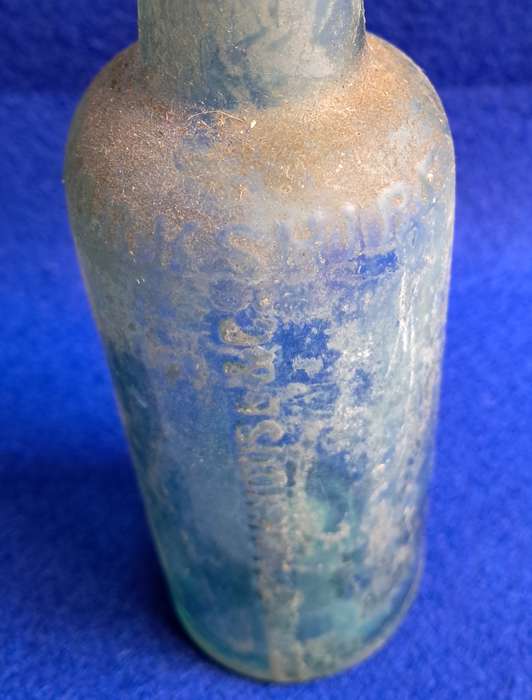 Antique glass bottle