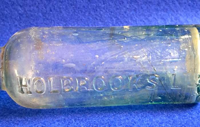 Antique glass bottle Holbrooks & Co