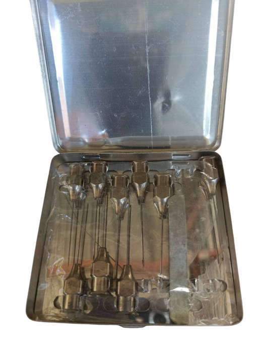 2 Vintage glass and metal syringes with 9 needles in metal box